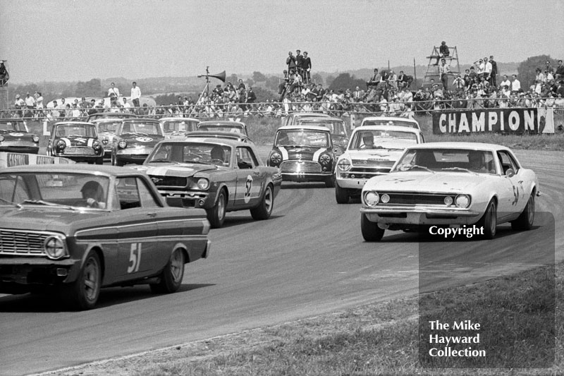 Peter Gethin, Ford Falcon, Thomas Lynch, Chevrolet Camaro; Bryan Thompson, Ford Mustang; John Miles, Ford Lotus Cortina; and John Rhodes, Cooper Car Company Mini Cooper S; Ovaltine Trophy Touring Car Race, Silverstone, British Grand Prix, 1967.&nbsp;
