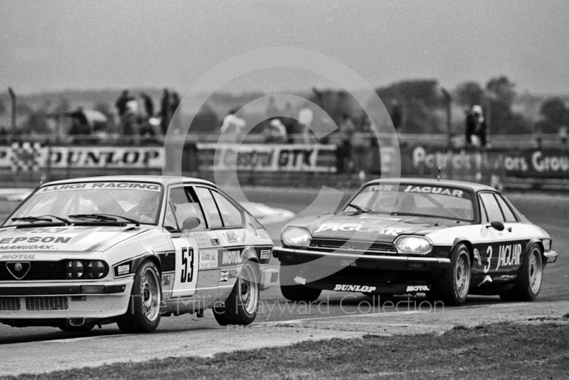 Win Percy/Chuck Nicholson Jaguar XJS HE breathing down the neck of Rinaldo Drovandi, Georges Cremer, Guy Pirenne,&nbsp;Alfa Romeo GTV6, Istel Tourist Trophy, European Touring Car Championship, Silverstone, 1984
