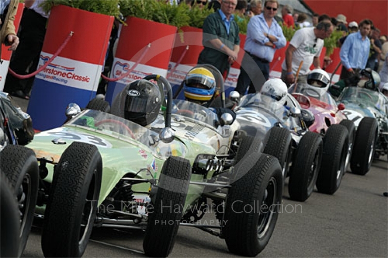 Rudolf Ernst, 1960 Lotus 18, heads the queue in the paddock prior to the HGPCA pre-1966 Grand Prix Cars Race, Silverstone Classic 2009.