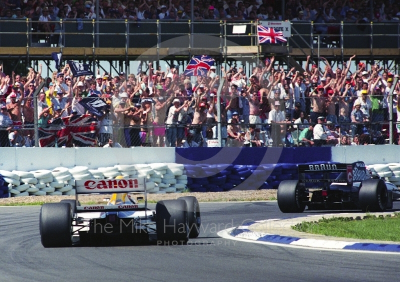 Nigel Mansell, Williams FW14, and adoring crowd, Silverstone, British Grand Prix 1991.
