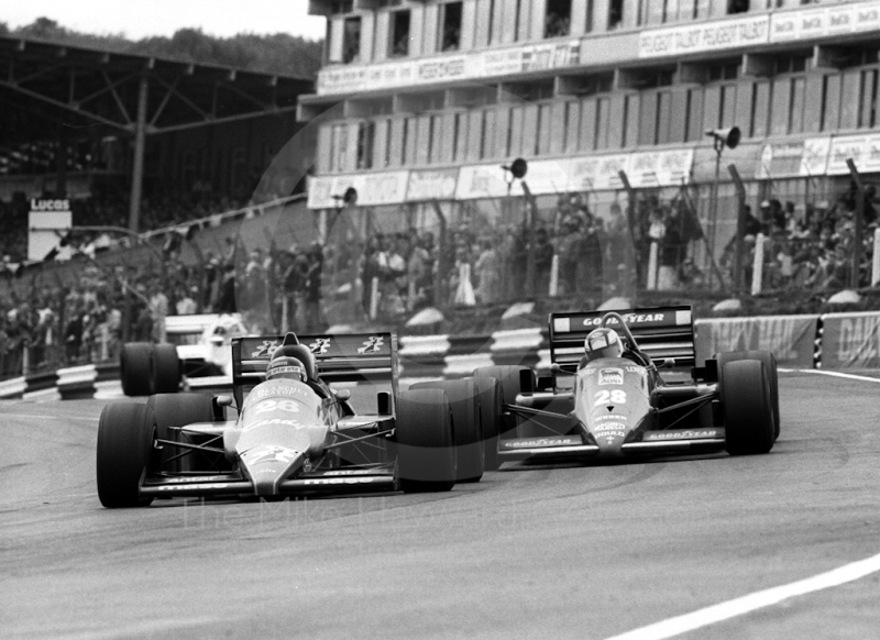 Jacques Laffite, Ligier JS25, and Stefan Johansson, Ferrari 156, at Paddock Bend, Brands Hatch, 1985 European Grand Prix.
