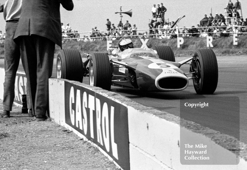 Jim Clark, Lotus 49 R2, at Copse Corner, Silverstone, on his way to victory at the 1967 British Grand Prix.
