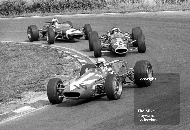 John Surtees, Lola T100 (SL/100/6) Ford, Jackie Oliver, Lotus 48 (R48-3) Cosworth&nbsp;and Brian Redman, David Bridges Motor Sports Lola T100&nbsp;(SL/100/4) at Druids Hairpin, Guards European F2 Championship, Brands Hatch, 1967
