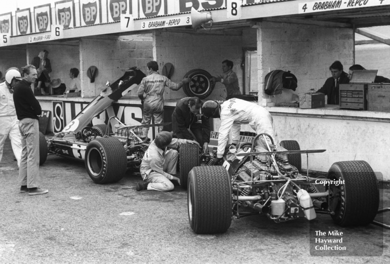 The Repco Brabham BT26 V8s of Jack Brabham, left, and Jochen Rindt in the pits during practice for the 1968 British Grand Prix at Brands Hatch.
