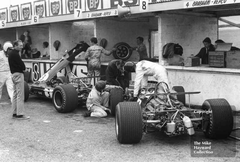 The Repco Brabham BT26 V8s of Jack Brabham, left, and Jochen Rindt in the pits during practice for the 1968 British Grand Prix at Brands Hatch.
