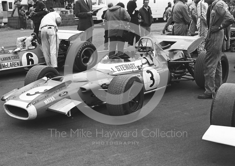 Jackie Stewart's Matra MS80 on the grid with Bruce McLaren in his M7C,&nbsp;Silverstone, 1969 British Grand Prix.
