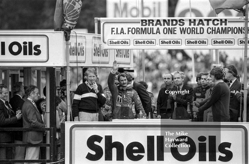 Nigel Mansell celebrates his first race win with Ayrton Senna and Frank Williams, Brands Hatch, 1985 European Grand Prix.
