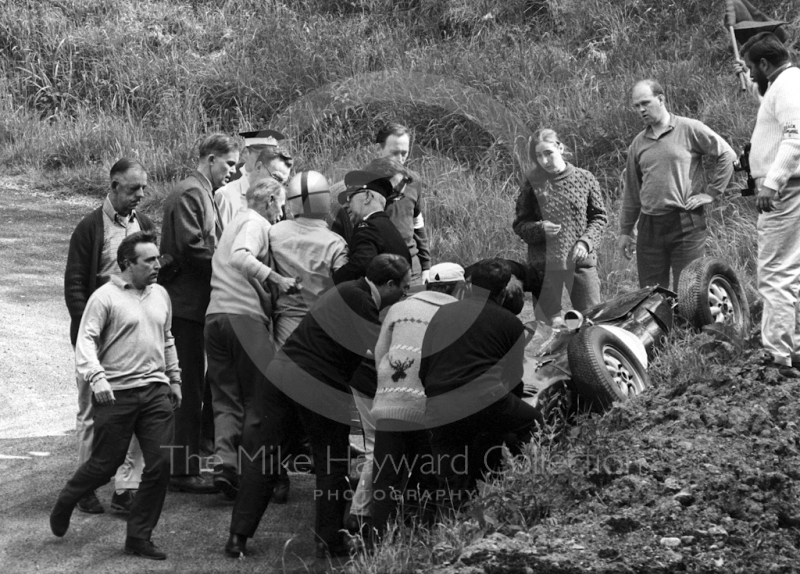 Marshals rush to the aid of John Creasey in his Lola at the Esses, Shelsley Walsh Hill Climb June 1967.