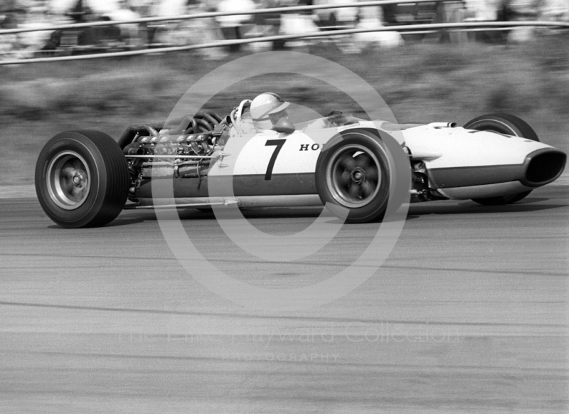 John Surtees, Honda V12 RA273F-102, exits Copse Corner at Silverstone, 1967 British Grand Prix.
