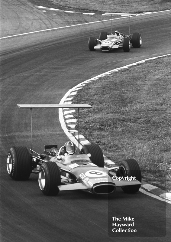 Graham Hill and Jack Oliver, Gold Leaf Team Lotus 49s, at Bottom Bend, Brands Hatch, 1968 British Grand Prix.