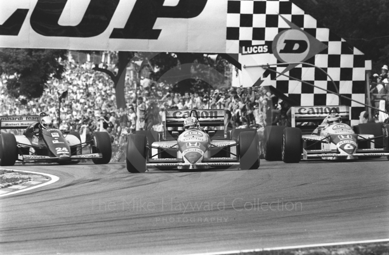 Nigel Mansell, Williams Honda FW11; Nelson Piquet, Williams Honda FW11; and Allessandro Nannini, Minardi M185B, Brands Hatch, British Grand Prix 1986.
