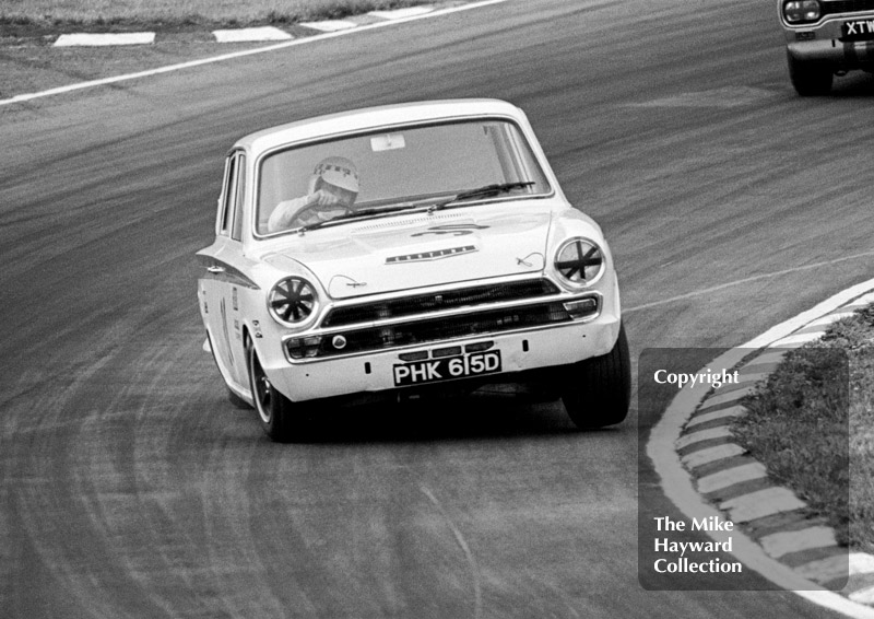 Barry Pearson,&nbsp;Lotus Cortina, reg no PHK 615D,&nbsp;at South Bank Bend, British Saloon Car Championship race, 1968 Grand Prix meeting, Brands Hatch.
