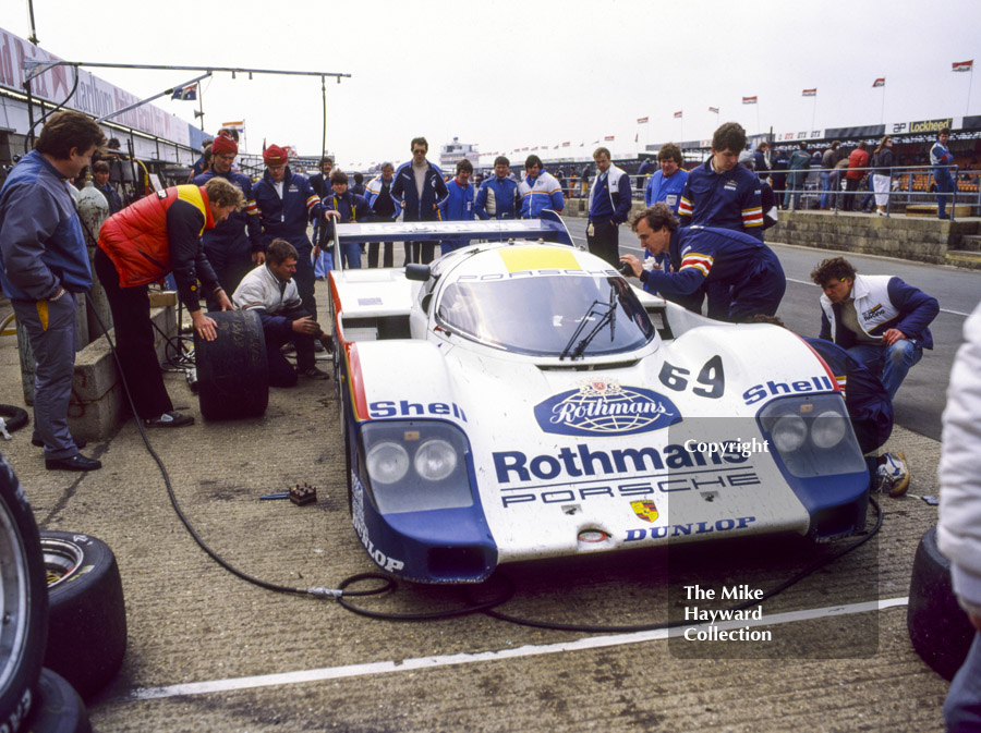 Vern Schuppan, James Weaver, Rothmans Porsche 956 pit-stop during practice, World Endurance Championship, 1985&nbsp;Grand Prix International 1000km meeting, Silverstone.

