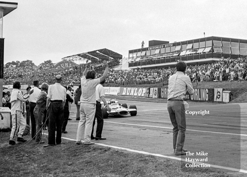 Jack Brabham, Brabham BT33, crosses the finish&nbsp;line after running out of fuel on the last lap at the 1970 British Grand Prix at Brands Hatch.
