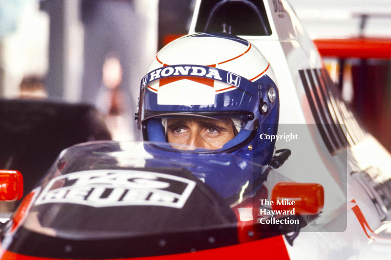 Alain Prost in the pits, McLaren MP4/5, Honda V10, during practice for the British Grand Prix, Silverstone, 1987.
