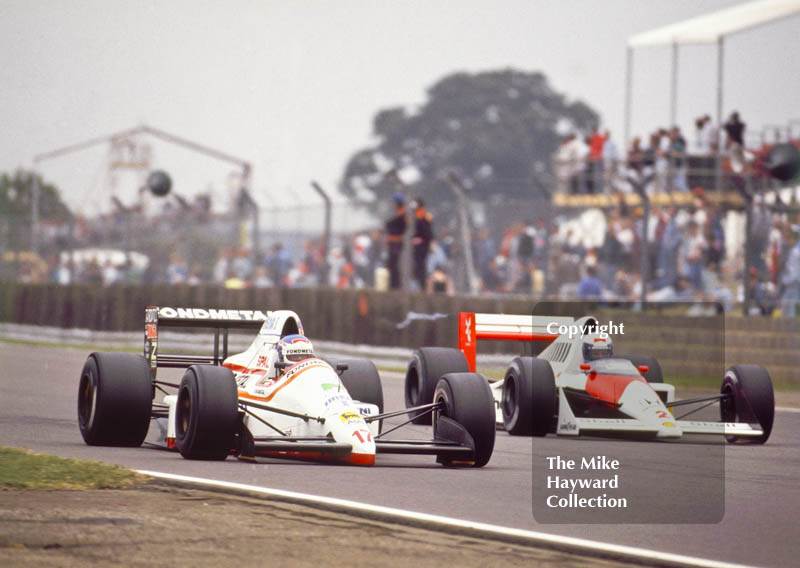 Nicola Larini, Osella FA1M, Cosworth V8, Alain Prost, McLaren MP4/5, Honda V10, British Grand Prix, Silverstone, 1989.
