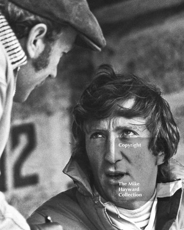 Jochen Rindt deep in conversation with team boss Colin Chapman before his second place finish in a Lotus 49C at the Race of Champions, Brands Hatch, 1970.
