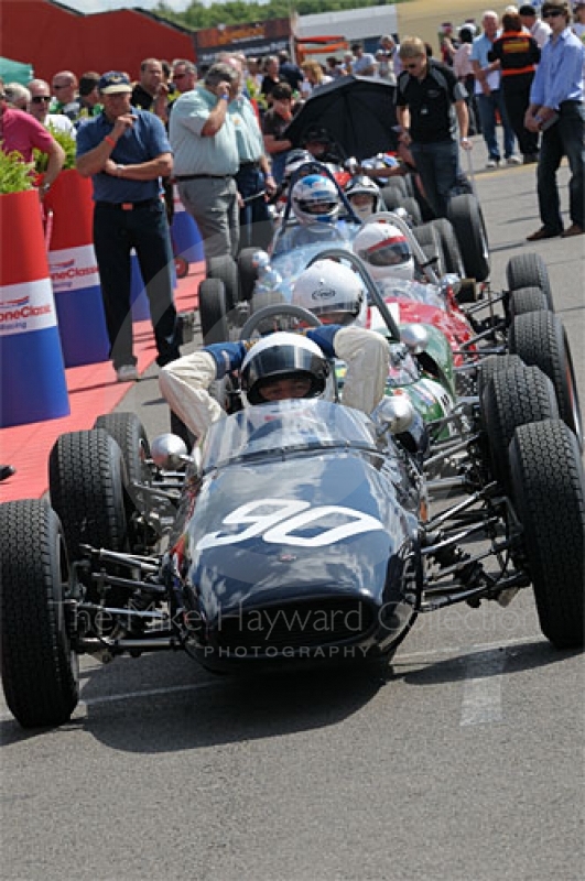 Emanuele Benedini, 1963 Brabham BT6, leads the queue in the paddock ahead of the Colin Chapman Trophy Race for Historic Formula Juniors, Silverstone Classic 2009.