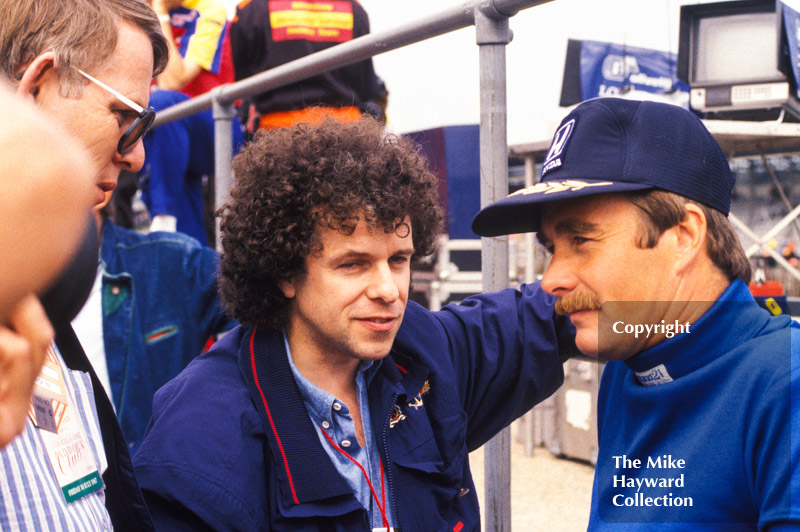 Nigel Mansell and Leo Sayer in the pits, Silverstone, 1987 British Grand Prix.
