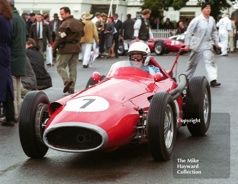 Stirling Moss leaves the paddock in a Maserati 250F for the Richmond and Gordon Trophies, Goodwood Revival, 1999.
