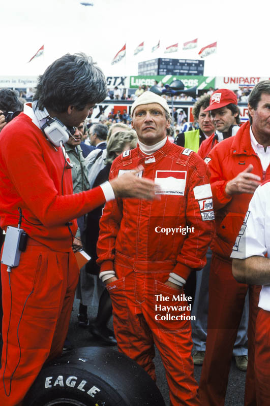 Niki Lauda, Marlboro McLaren MP4, ponders the weather on the grid, British Grand Prix, Silverstone, 1983.
