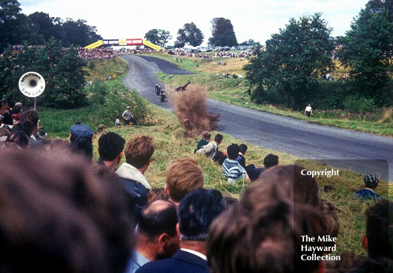 Motorcycle hitting the bank at Knickerbrook, Oulton Park, 1963.
