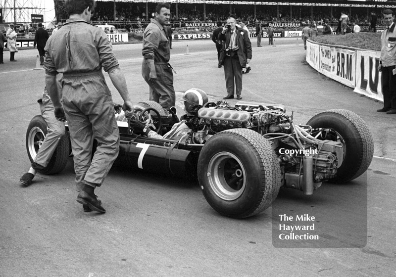 Jo Siffert, Rob Walker Cooper Maserati T80 V12, on his way to the grid at the Silverstone International Trophy, 1966.
