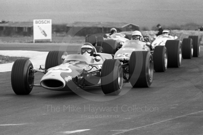 Jack Oliver, Lotus 48, followed by Jo Schlesser, McLaren M4A, Kurt Ahrens, Brabham BT23C, Thruxton, Easter Monday 1968.
