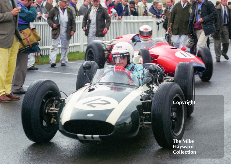 Jack Brabham, Cooper T53 Climax, and Derek Bell, Cooper T51 Maserati, set off for the Richmond and Gordon Trophies, Goodwood Revival, 1999.
