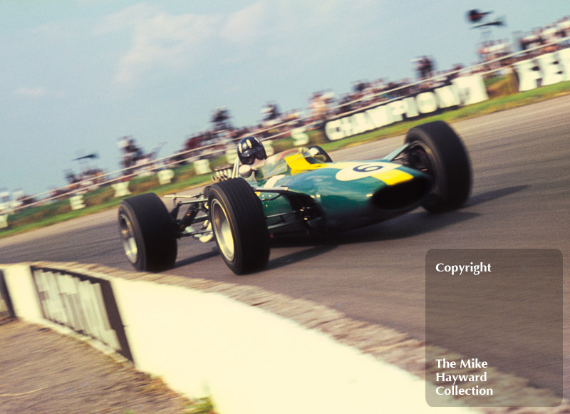 Graham Hill, Lotus 49 Cosworth, at Copse Corner, Silverstone, 1967 British Grand Prix.
