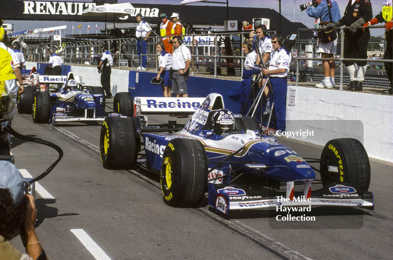 Damon Hill and David Coulthard waiting in the pit lane, Silverstone, 1995 British Grand Prix.
