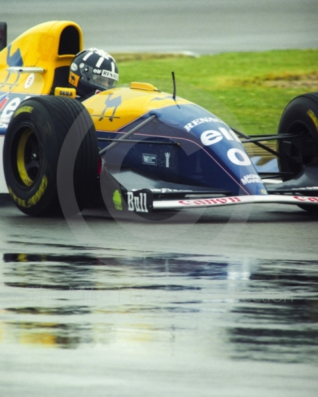 Damon Hill, Williams Renault FW15C, seen during wet qualifying at Silverstone for the 1993 British Grand Prix.
