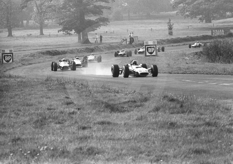 Jackie Stewart, F2 Matra Ford MS7, followed by Frank Gardner, Repco Brabham BT19, aproaches Esso Bend in the Oulton Park Gold Cup 1967.
