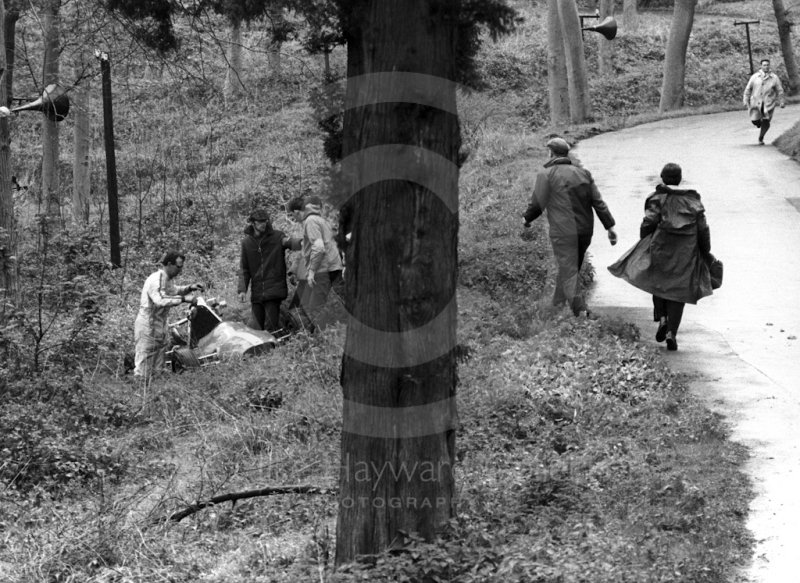 Marshals help a competitor in the woods, Newton Oil Trophy Meeting, Prescott Hill Climb, September 1967.