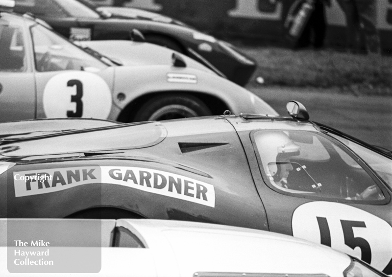 Frank Gardner, Alan Mann Ford F3L on the grid alongside Mike de Udy, Lola T70, 1968 Martini International 300, Silverstone