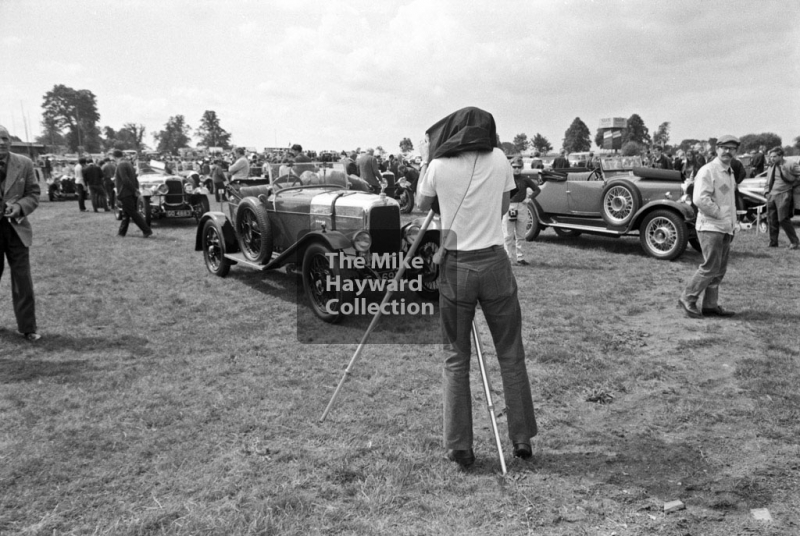 Photographer in the paddock, 1969 VSCC Richard Seaman Trophies meeting, Oulton Park.