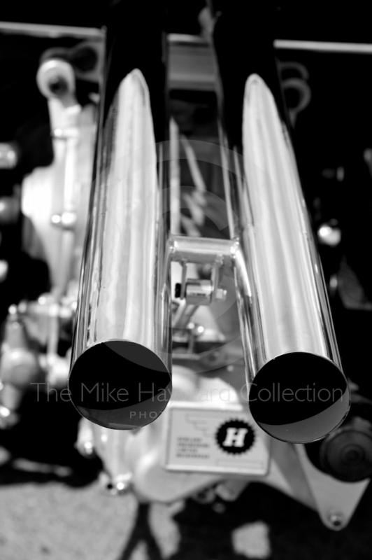 Black and white study of Lotus 25 exhaust pipes, Silverstone Classic 2010