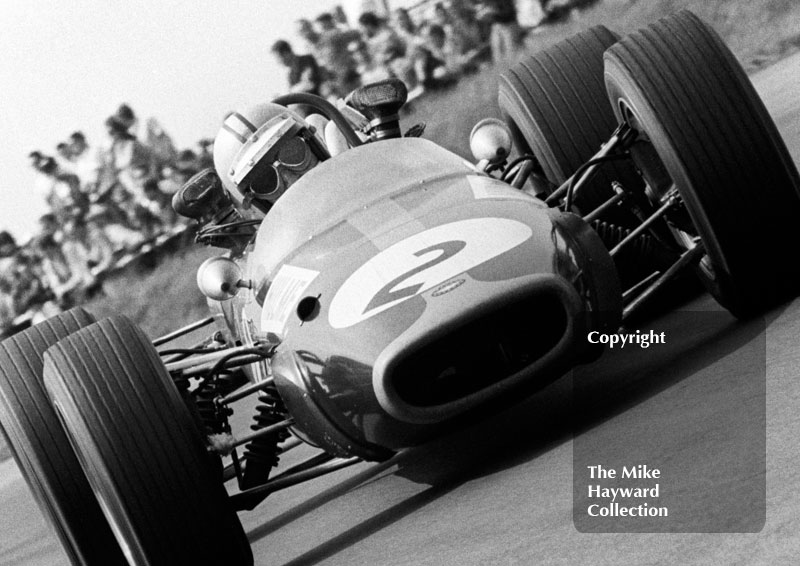 Denny Hulme, Repco Brabham V8 BT24/2, Copse Corner, Silverstone, 1967 British Grand Prix.
