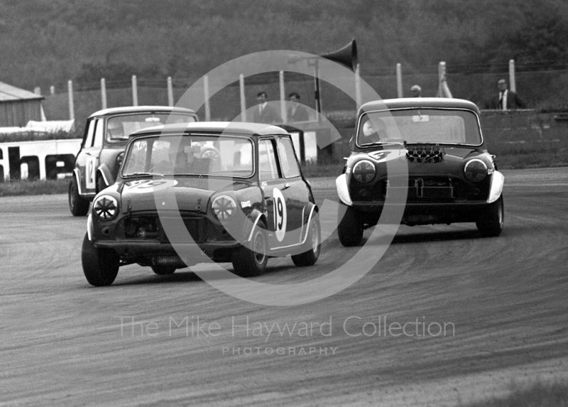 Richard Longman, JanSpeed Engineering Mini Cooper S; Harry Ratcliffe, British Vita Racing Mini Cooper S; and Alec Poole, Don Moore Mini Cooper S; Becketts Corner, invitation race, Silverstone Martini International Trophy 1968.
