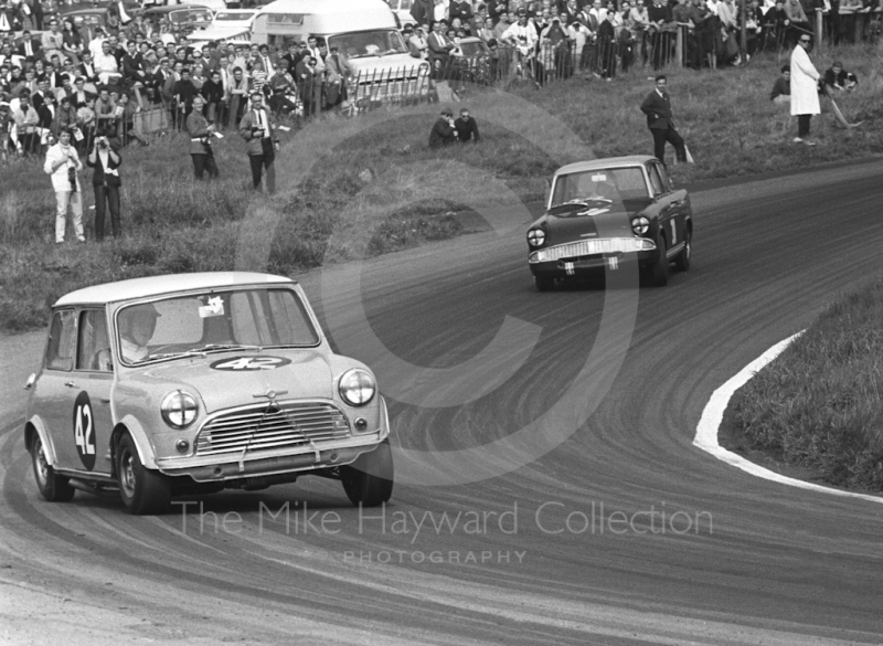 Gordon Spice, Mini Cooper S, ahead of John Fitzpatrick, Broadspeed Ford Anglia, Cascades Bend,&nbsp;Oulton Park Gold Cup meeting, 1967.
