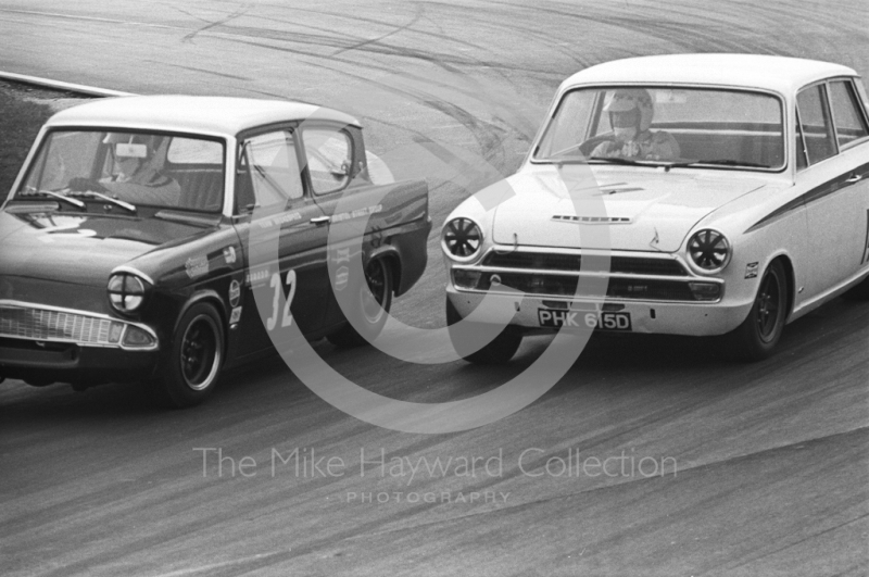 Mike Walker, Team Broadspeed Ford Anglia, and Barry Pearson, Lotus Cortina, PHK 615D, Thruxton Easter Monday meeting 1968.
