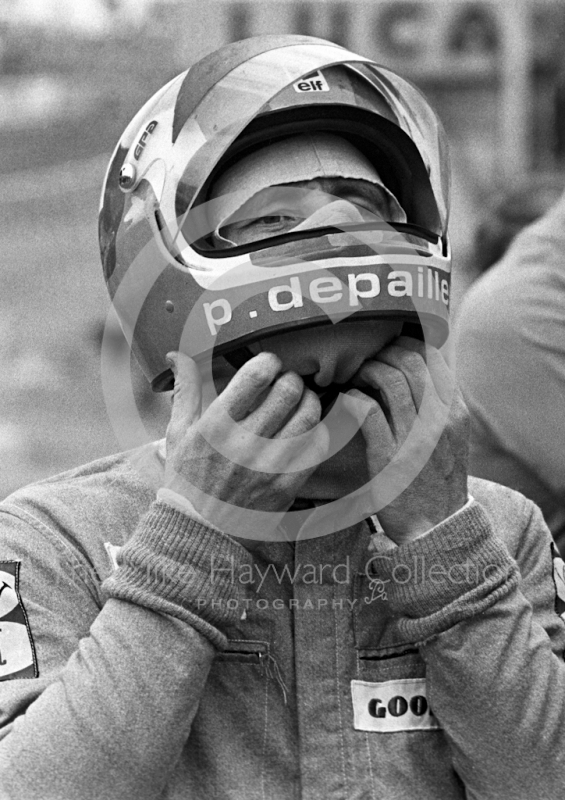 Patrick Depailler puts on his helmet, Brands Hatch, British Grand Prix 1974.
