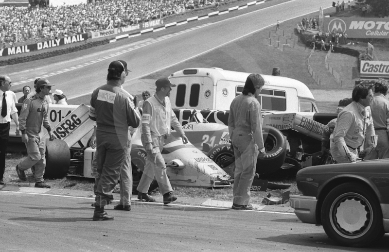 Thierry Boutsen, Arrows, and Piercarlo Ghinzani, Osella, after first lap accident, Brands Hatch, British Grand Prix 1986.
