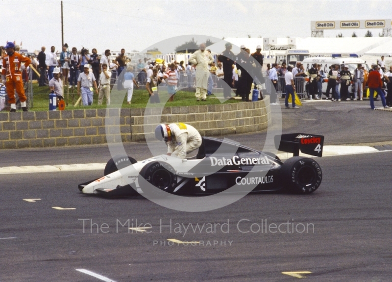 Philippe Streiff, Tyrrell DG016, parks at Woodcote, British Grand Prix, Silverstone, 1987
