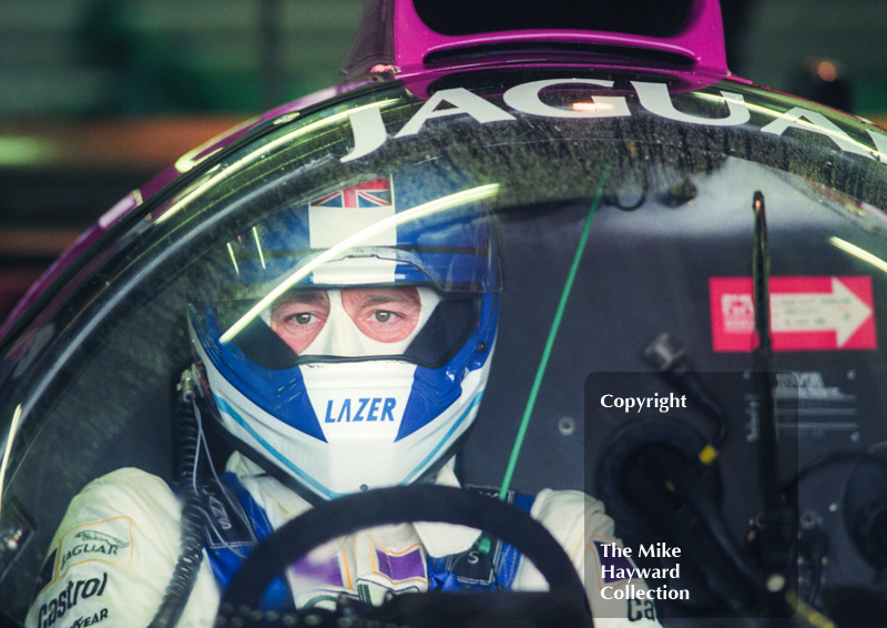 Derek Warwick, Silk Cut Jaguar XJR-14 Cosworth V12, in the pits, Castrol BRDC Empire Trophy, World Sports Car Championship, Silverstone, 1991.