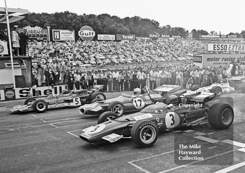 Jacky Ickx, Ferrari 312B, Jack Brabham, Brabham BT33 and Jochen Rindt, Lotus 72C, lead off the grid at the start of the 1970 British Grand Prix at Brands Hatch.

&nbsp;

Note: this is a cropped version of image <a href="https://www.mikehaywardcollection.com/motor-sport/formula-1/1970-1979/british-grands-prix-1366677424/1970-british-gp-1762726702/jacky-ickx-leads-off-the-grid.html">MH4915</a>
