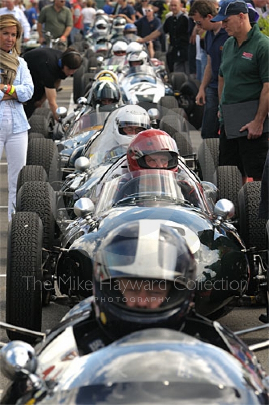 Cars queue in the paddock for the HGPCA pre-1966 Grand Prix Cars Race, Silverstone Classic 2009.