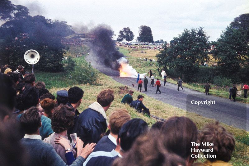 Motorcycle on fire at Knickerbrook, Oulton Park, 1963.
