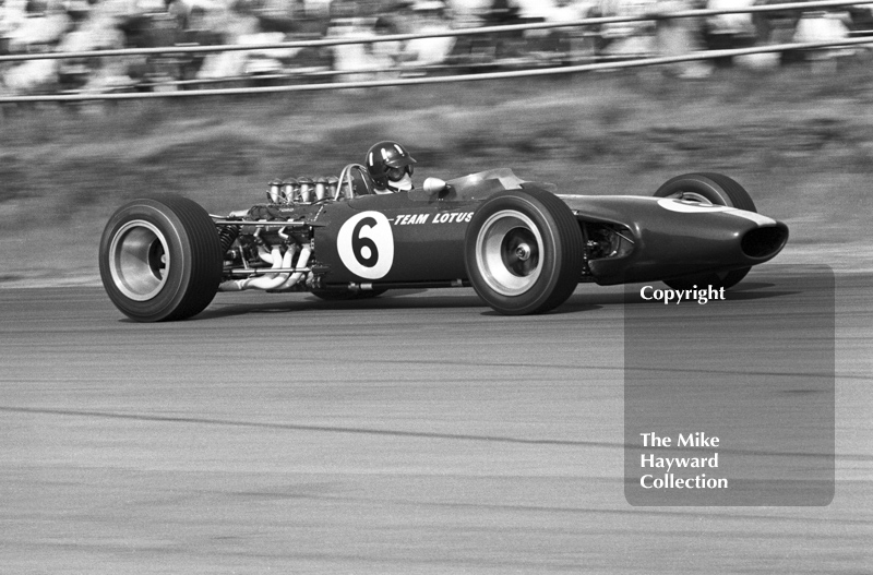 Graham Hill, Lotus Cosworth 49 R3, at Copse Corner, Silverstone, 1967 British Grand Prix.