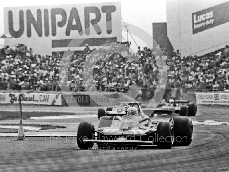 Jody Scheckter, Ferrari 312T4 V12, at Woodcote, Silverstone, British Grand Prix 1979.
